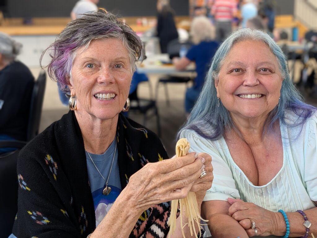 Wisdom in Action, Participants learn how to make corn husk dolls, Six Nations of the Grand River, August 2026.